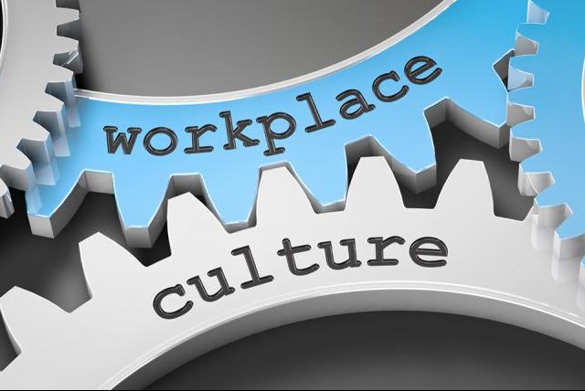 Workplace culture written on cogs